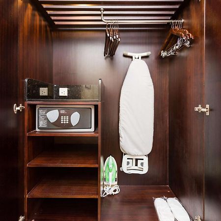 Radisson Blu Coimbatore Dış mekan fotoğraf A hotel room wardrobe with a safe