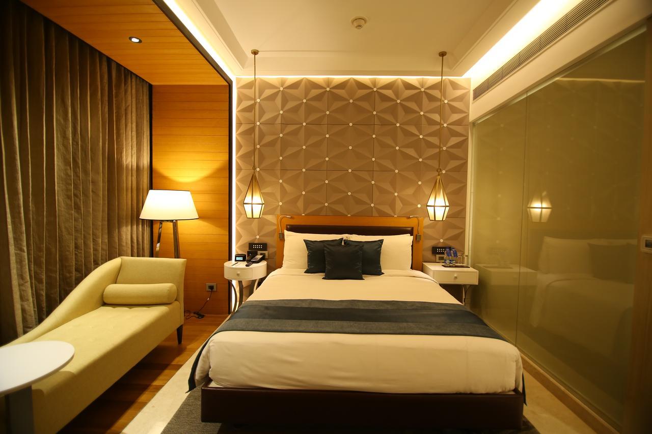 Radisson Blu Coimbatore Dış mekan fotoğraf A room at the hotel